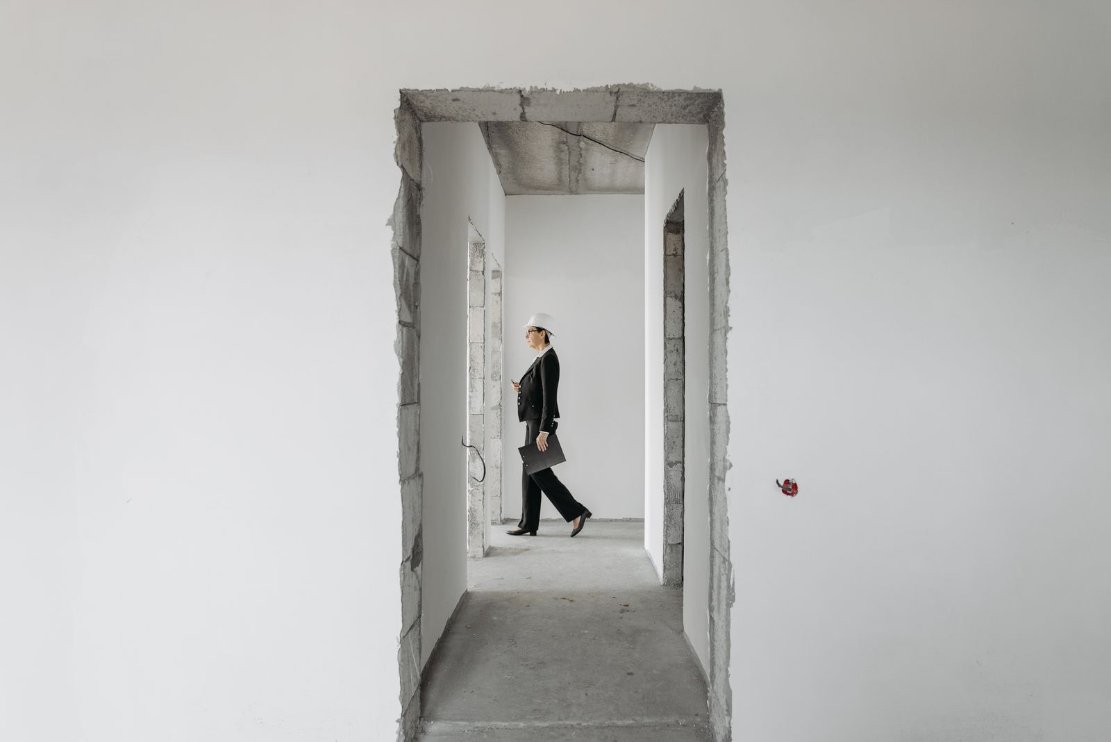 Professional inspecting a building